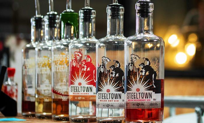 Steeltown and Dragon's Breath Gins, Vodkas, and Rums at Spirit of Wales distillery.